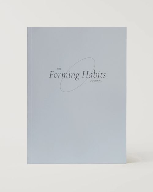 A minimalist light blue journal with the title "The Forming Habits Journal" in elegant black font. Modern and calming design.